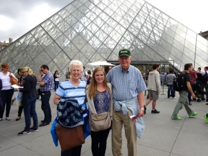 My grandparents and I in front of Le Louvre